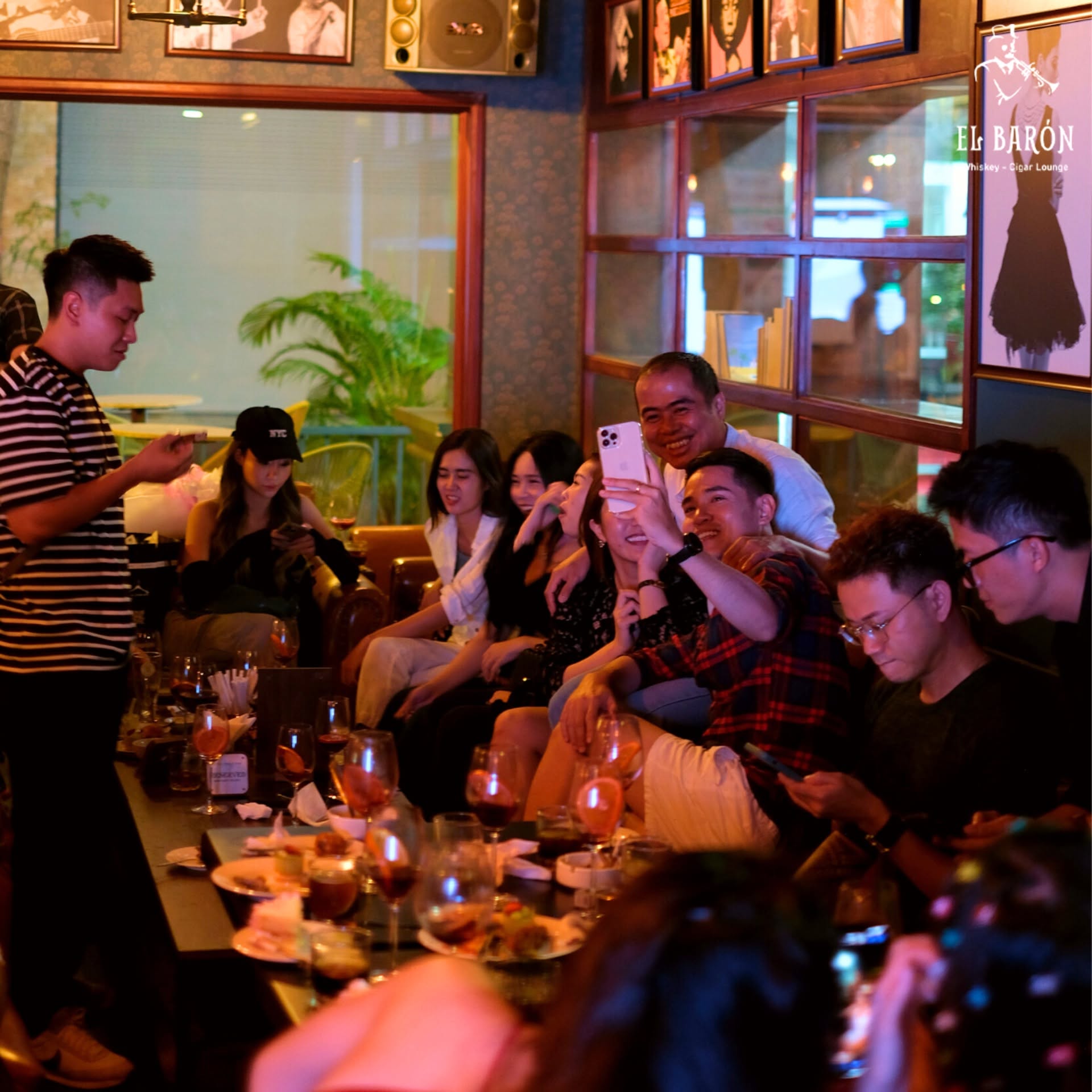 Live jazz band performance with double bass and saxophone at an intimate jazz bar in Saigon
